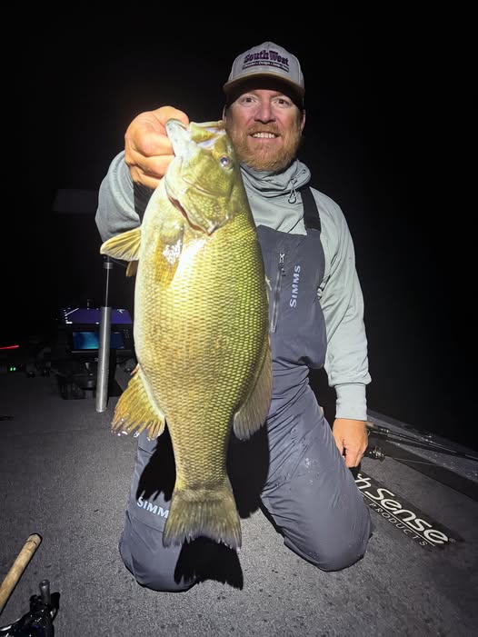 Josh Jones holding a trophy bass